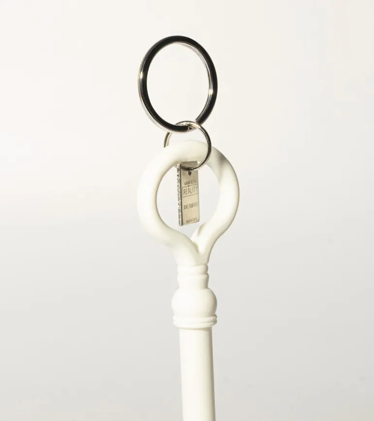 Porte-clés en forme de clé phosphorescente