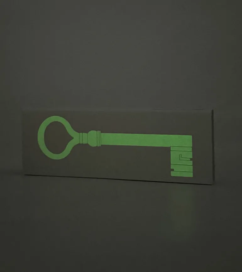 Porte-clés en forme de clé phosphorescente