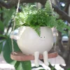 Pot à plante balançoire