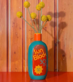Vase crème solaire